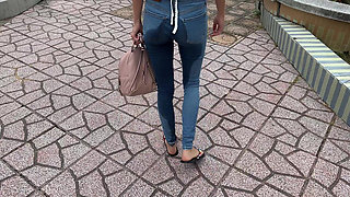 Public Wetting Jeans in Park Near the Beach