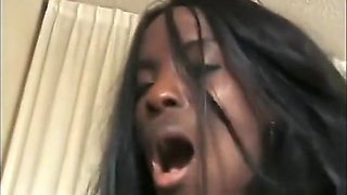 Slender black beauty rubs her clit while a white guy punishes her ass