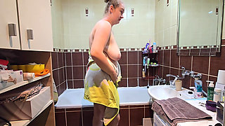 Blonde BBW Wife Enjoys a Hot Shower in the Bathroom