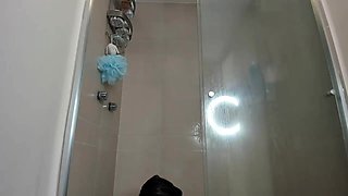 Hot babe with perfect big boobs taking shower