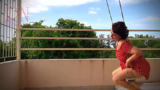 Beutiful lady swinging without panties on a swing outdoors. Slow motion 127 f