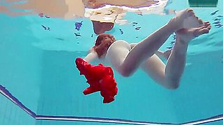 Red Dressed teen 18+ Swimming With Her Eyes Opened
