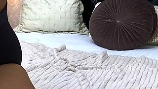 Brunette enjoys the toy on gaping pussy while masturbating