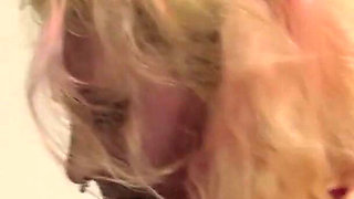 Blonde busty chick is pleasing guy's cock with her huge tits