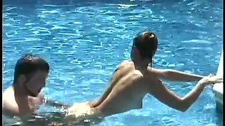 Nice bikini brunette gets poked doggy in the swimming pool