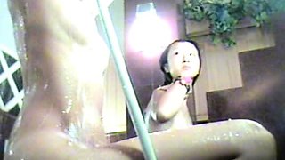 Loud asian chick fingering on hidden cam