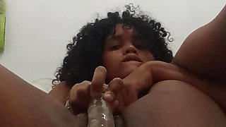 Indian Aunt gets playful with her dildo until she squirts
