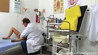 Natural big busty stepmom caught on her gyno exam
