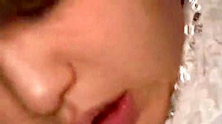 Her breasts are massaged, she squirts with fingering, and then she gets fucked deep in the throat.