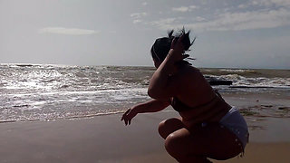 Big ass brunette Latina is very horny and ends up masturbating on the beach, sand and sun