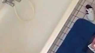 Sexy chubby amateur fucks herself in the bathroom