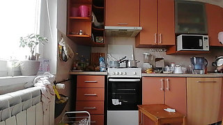 Sexy amateur wife prepares breakfast naked in the kitchen.