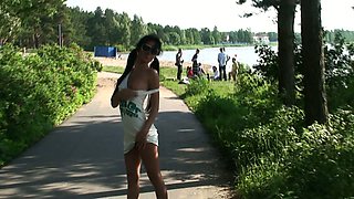 Sassy and lean bronze skin teen flashes her pussy in the park