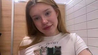 Blonde teen slut plays with a toy banana