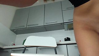 Hot babe cant wait but masturbating in kitchen