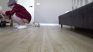 Home camera watches fat legs from below on the floor. Mature wife changes into a sexy nurse uniform. Foot fetish.