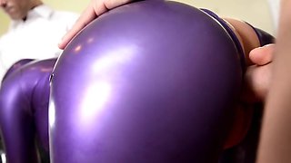 Two guys fuck slut in purple latex cat suit with facial