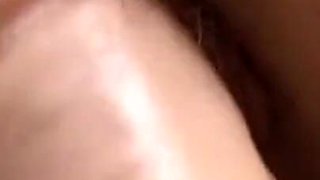 Brunette plays with dildo