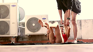 Woman in Red at the Rooftop