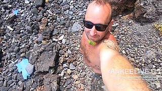 Short-haired tattooed girlfriend gives outdoor beach blowjob
