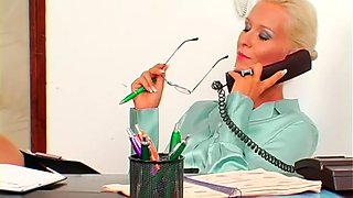 Sexy blonde secretary allows her boss to suck nipples