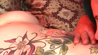 Tattooed vixens licking wet twats