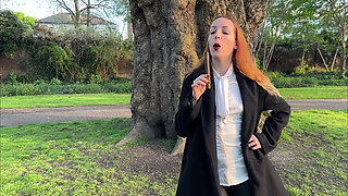 Liz Rainbow Smoking a Flor De Oliva Cigar Outdoors