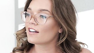 Sexy angel in glasses Katie Kush fucks with a sweet black dildo