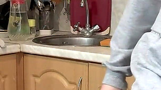 A Beautiful Bitch with a Fucking Amazing Pussy Is Masturbating in the Kitchen.