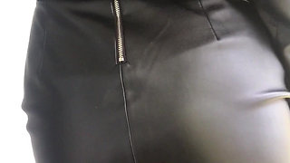 Check Out My Black Shoes, Fishnet Tights, Form-fitting Leather Skirt, and Sexy Leather Jacket
