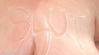 WRITING ON MY MATURE BBW SAGGY TITS