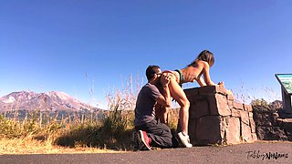 Amazing busty brunette slut doing blowjob outdoor
