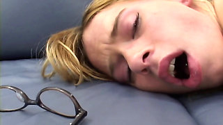 Penny Lane screaming as she takes a huge black python