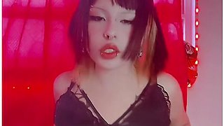 Dark-haired beauty smoking and squeezing tight