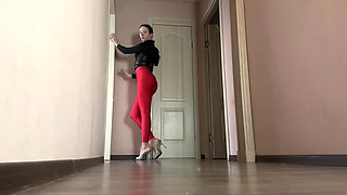 Asmr Mistress in Latex and Red Leggings Strides Across the Room