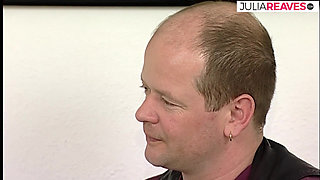 Blonde hottie sucks a huge dildo then rides it on the bed