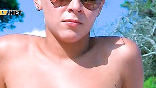 Playful young nudist chicks caught on a voyeur camera