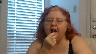 Mature BBW Redhead Nurse Vicki Talks to You as She Makes a Lipstick Applying Video for You!