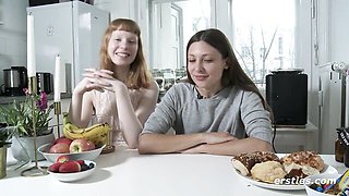 Bonnie kitchen chat then lesbian face-sitting on grey bed
