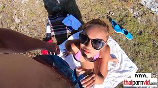 Amateur Thai teen fucking a BWC at beach
