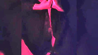 Naughty Brunette in the Dark Room Doing Stripetese